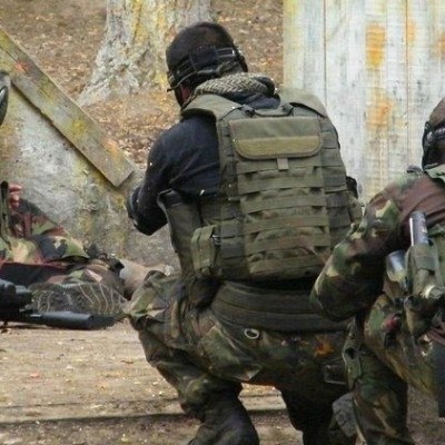 a person sitting in uniform